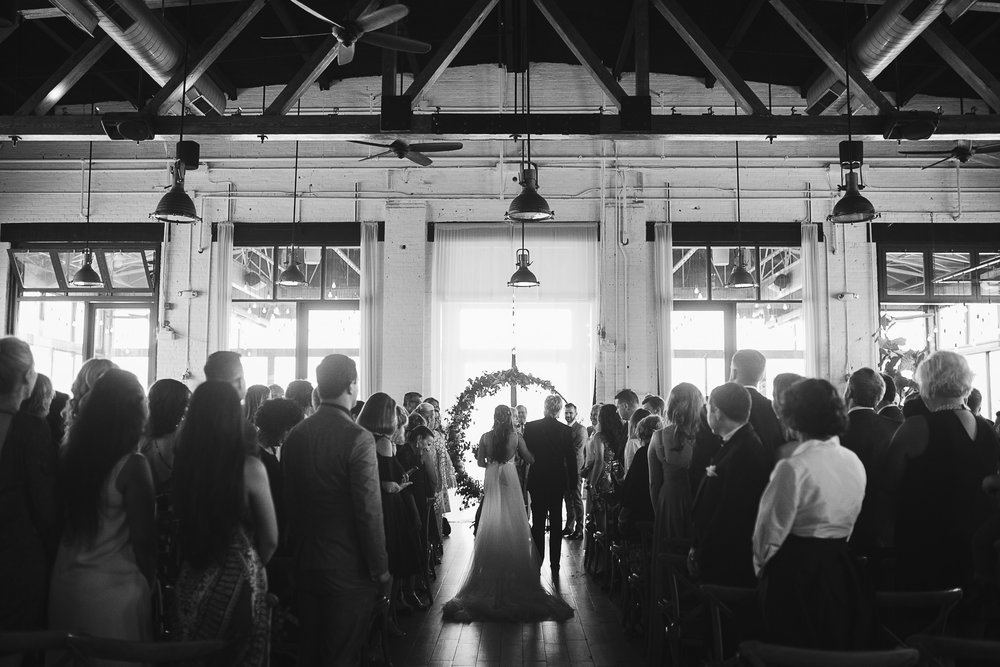  A black and white photo of the ceremony at this Battello Wedding in Jersey City, NJ 