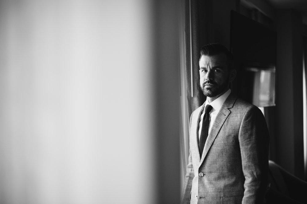  A black and white portrait of the groom before the wedding at this Battello Wedding in Jersey City, NJ 
