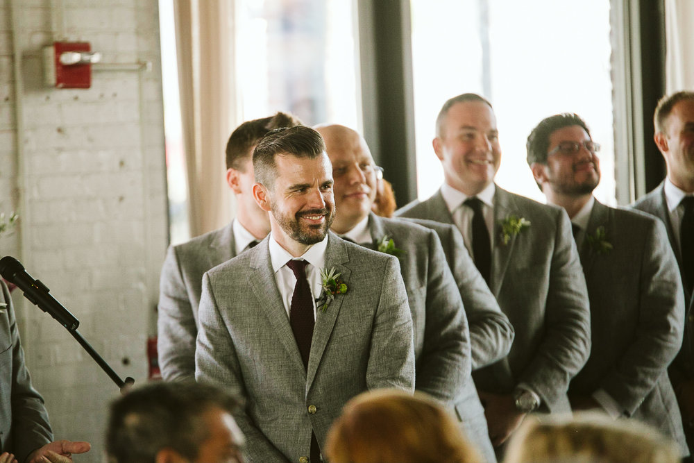  The groom’s reaction to the bride walking down the aisle at this Battello Wedding in Jersey City, NJ 