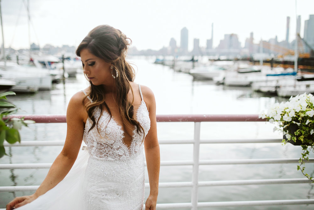  A portrait of the bride with the marina in the background at this Battello Wedding in Jersey City, NJ 