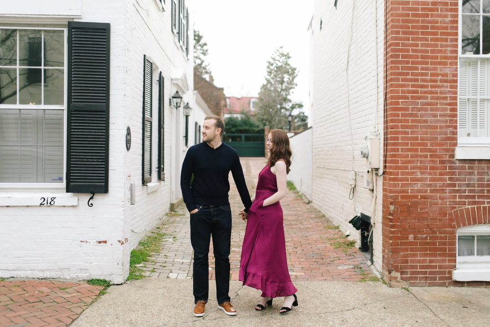  A leather jacket and maroon dress at this urban DC Area Engagement Shoot - Alexandria, VA 