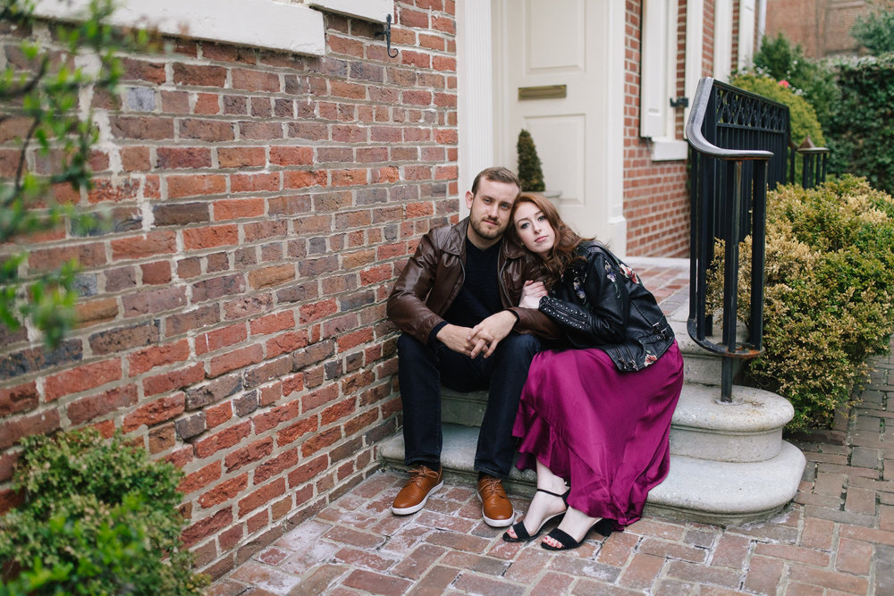  A leather jacket and maroon dress and a brick wall at this DC Area Engagement Shoot - Alexandria, VA 