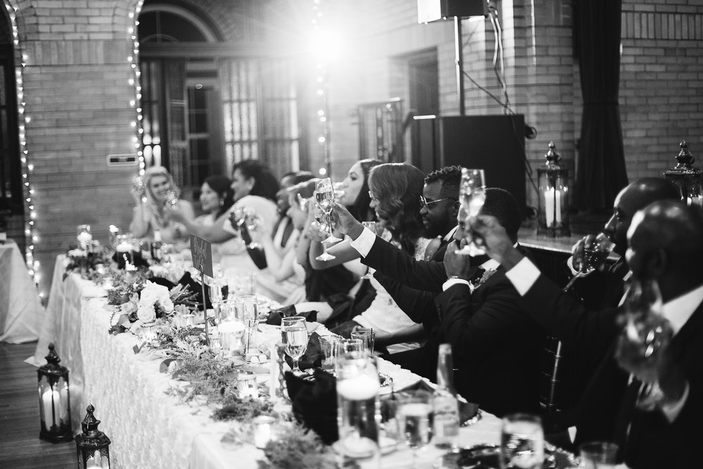  champagne toast during winter wedding at st francis hall in washington dc 