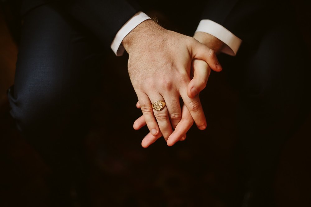  custom ring worn by groom on wedding day 