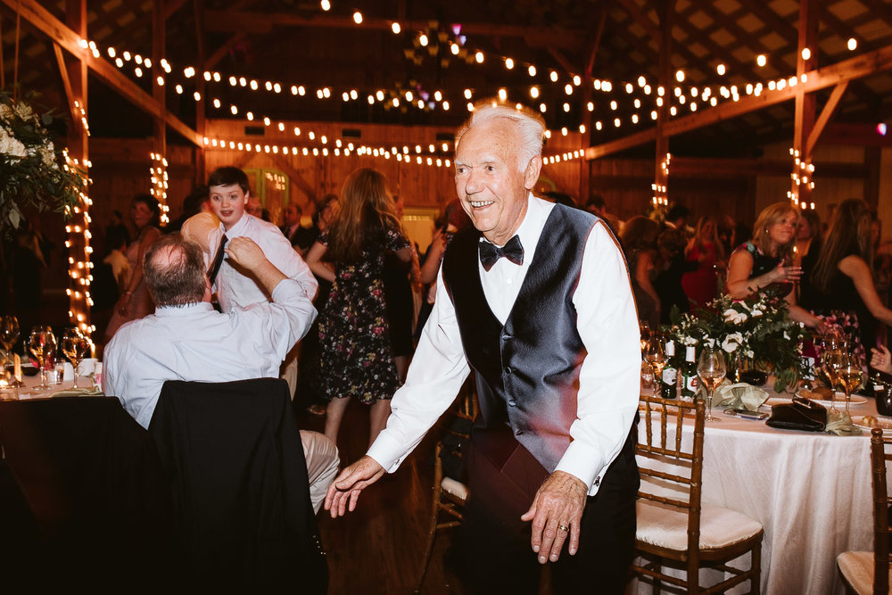  grandpa dancing at wedding reception 