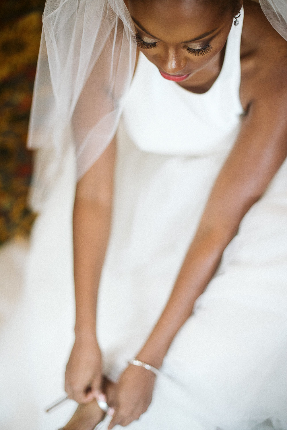  bride with wedding shoes 