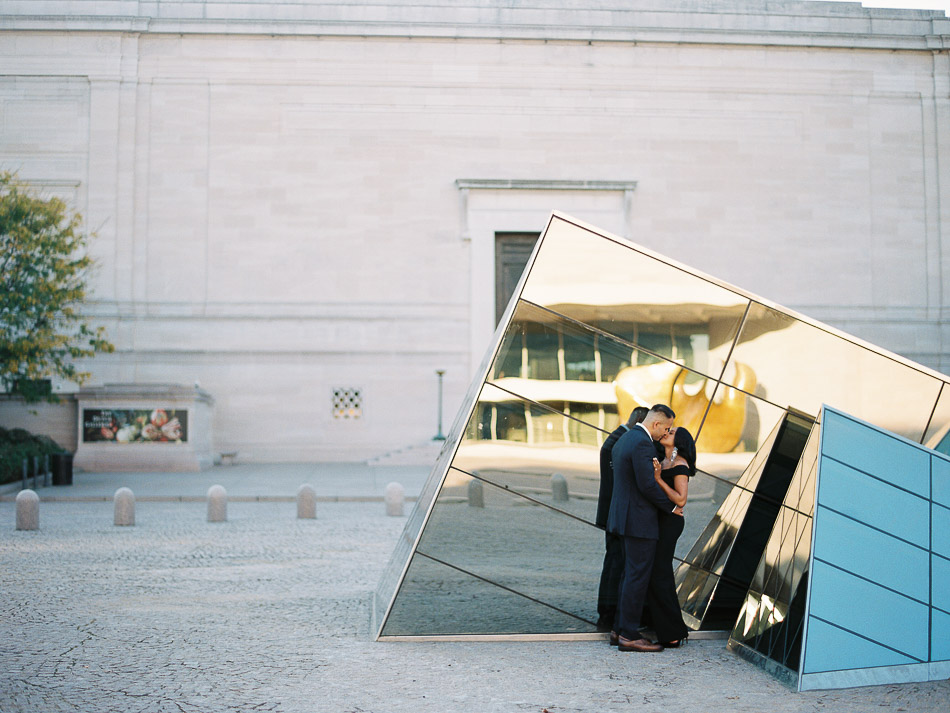 Couple poses outside of the national gallery of art in washington DC
