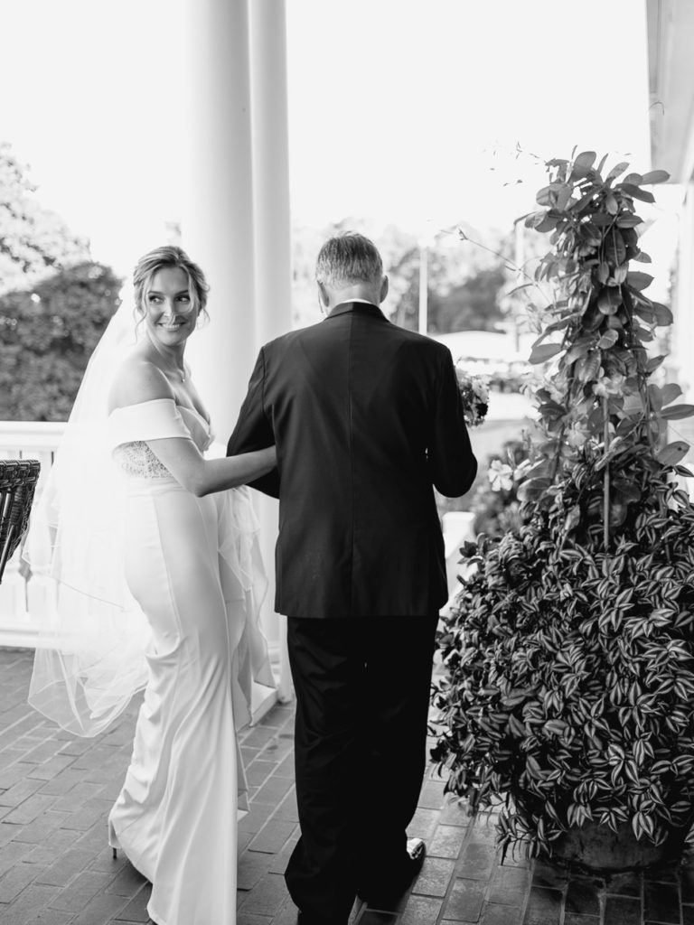 bride and father in black and white on wedding day